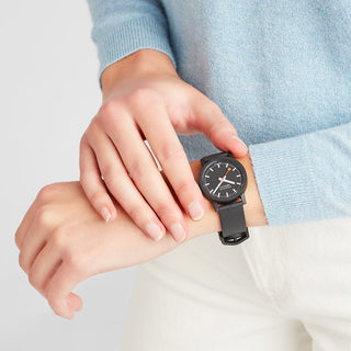 essence black, 32mm, vegan sustainable watch, MS1.32120.RB, Outdoor image with wrist watch worn