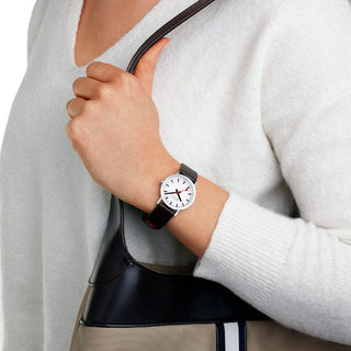 Classic, 30mm, stainless steel polished Case Material and black vegan grape leather strap, A658.30323.11SBBV, Person mit Armbanduhr am Handgelenk