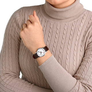Classic, 30mm, brown vegan grape leather strap, A658.30323.11SBGV, Person mit Armbanduhr am Handgelenk
