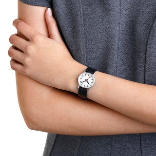 Classic, 30mm, stainless steel brushed Case Material and black vegan grape leather strap, A658.30323.16OMV, Person mit Armbanduhr am Handgelenk