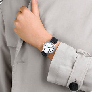 Classic, 36mm, stainless steel brushed Case Material and black vegan grape leather strap, A660.30314.16OMV, Person mit Armbanduhr am Handgelenk