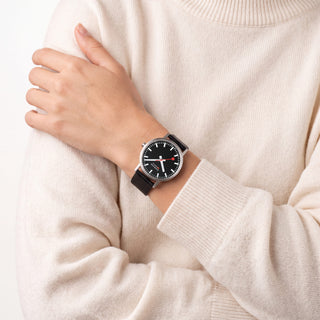 Classic Black Dial, Brushed Case, Black Vegan Grape Leather, 36 mm, worn with a cream knit sweater