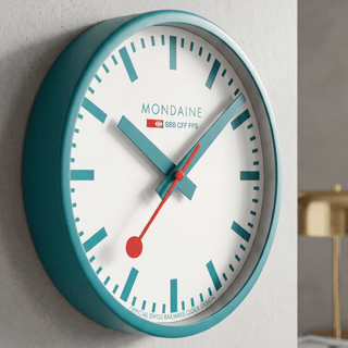 Teal Wall Clock, 25 cm	, Mood image with wrist watch worn