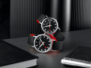 Classic Black Dial 40 mm and 36 mm, Brushed Case, Black Vegan Grape Leather, on a desk