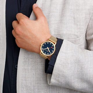 Classic, 40 mm, Deep Ocean Blue Golden stainless steel Watch, A660.30360.40SBM, mood image with wrist watch worn