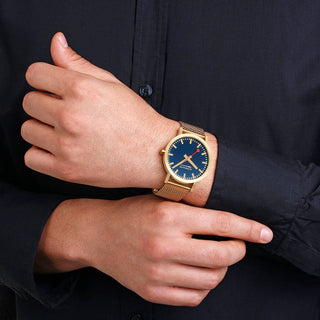 Classic, 40 mm, Deep Ocean Blue Golden stainless steel Watch, A660.30360.40SBM, mood image with wrist watch worn